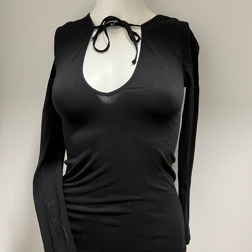 Long sleeve tight shirt with tie. Free people